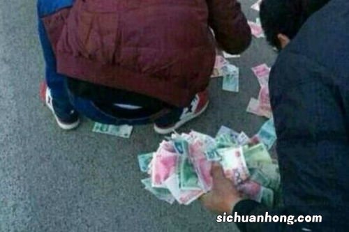 女人梦见捡到很多钱什么意思